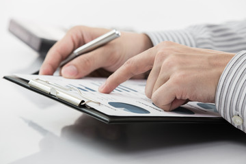 Fototapeta premium business report and man hand