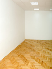 Home or office renovation, varnished oak parquet floor in room