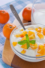 cream cottage cheese with sliced persimmons