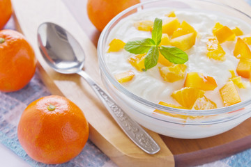 cream cottage cheese with sliced persimmons
