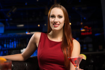 Portrait of an attractive woman in a nightclub