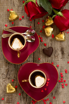 Cup of coffee in the form of hearts with roses. Valentine's Day