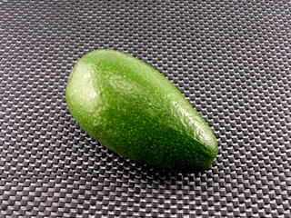 Avocado on black background