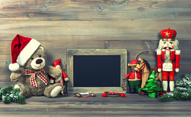 christmas decoration with antique toys and blackboard