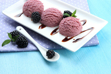 Delicious ice cream on plate on table close-up