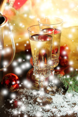Composition with Christmas decorations and two champagne