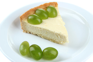 Slice of cheesecake with grape berries