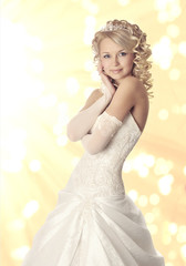 Portrait of a bride on yellow bokeh  background.