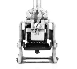 Old metal stamp, isolated on white