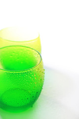 Two empty color  glasses, isolated on white