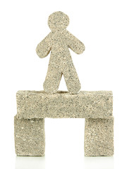 Building blocks with little man isolated on white