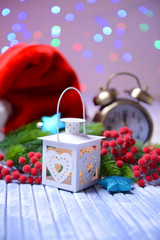 Christmas lantern, fir tree and decorations  on light
