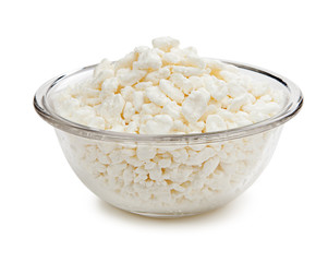 Cottage cheese in a glass bowl isolated