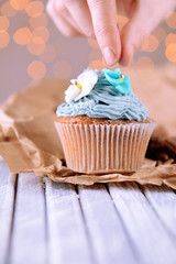 Tasty cupcake with butter cream,
