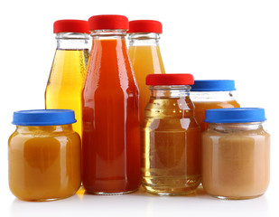 Baby food in glass jars, isolated on white