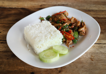 Fried pork with sweet basi and white jasmine sticky rice