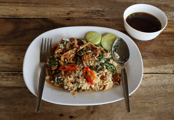 Fried pork with sweet basi and white jasmine sticky rice