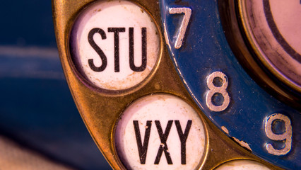 Old telephone dial with letters for antique texting