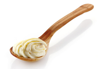 wooden spoon with cream cheese