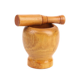 Wooden mortar with pestle.