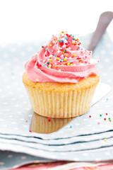 Cupcake with frosting and sprinkles