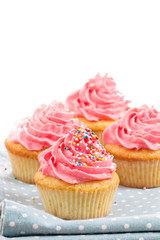 Cupcakes with frosting and sprinkles