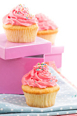 Cupcakes with frosting and sprinkles