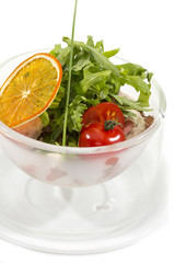 tomatoes and cheese in a glass bowl