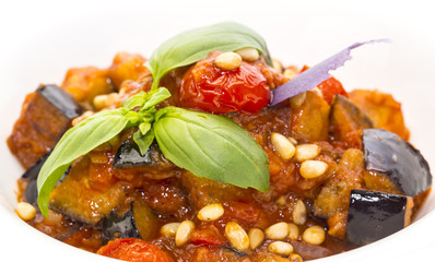 salad of steamed zucchini on a white dish at restaurant