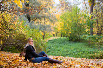 Woman in autumn park