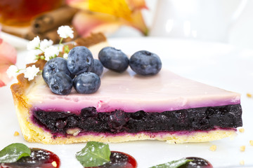 piece of blueberry pie on a table in a restaurant