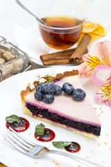 piece of blueberry pie on a table in a restaurant