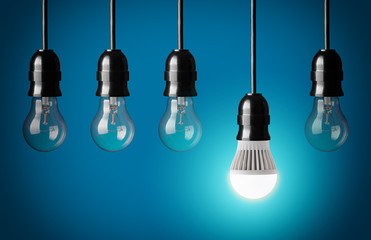 Glowing LED bulb and simple light bulbs