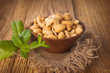 cashew nut on wooden table 