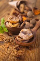 Figs (dried) on a wooden table 