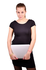 Isolated confident woman portrait with laptop computer.