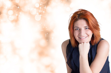 Happy smiling woman with red hair