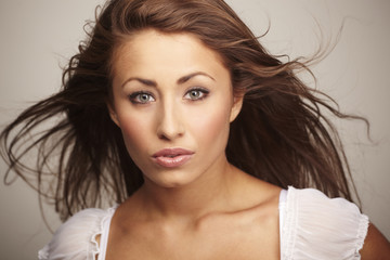 Fototapeta premium attractive young woman relaxing on white background