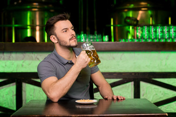 Drinking fresh beer.