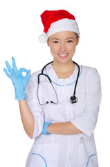 Doctor  with stethoscope endorses Christmas