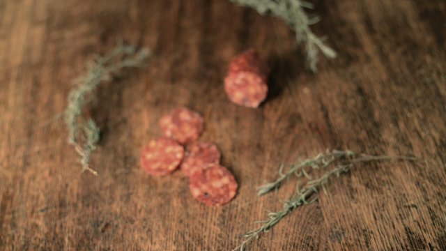Salami on wooden table