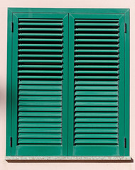 Window with green shutters