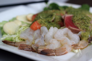 Raw shrimp ,Salmon and Tuna with spicy sauce