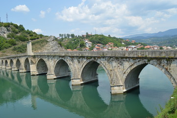 Fototapeta na wymiar The old bridge from the 16th century on the Drina