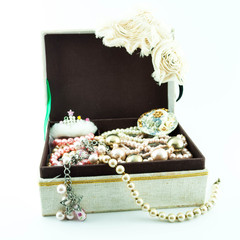 jewelry box with jewelry  - Treasure of pearls on white
