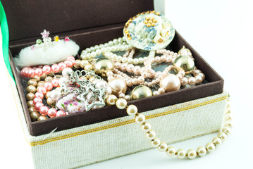 jewelry box with jewelry  - Treasure of pearls on white