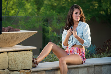 Confident beautiful brunette fashion model