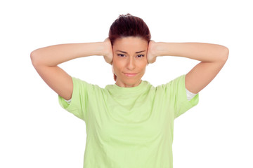 Nervous woman covering her ears isolated