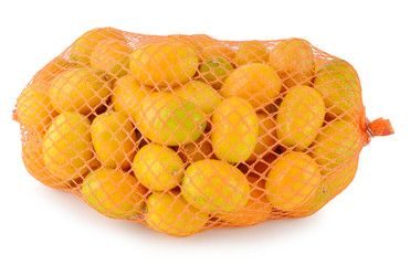 Fresh orange in plastic netting sack on white background