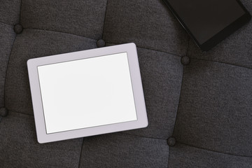 Tablet pc on couch in the office